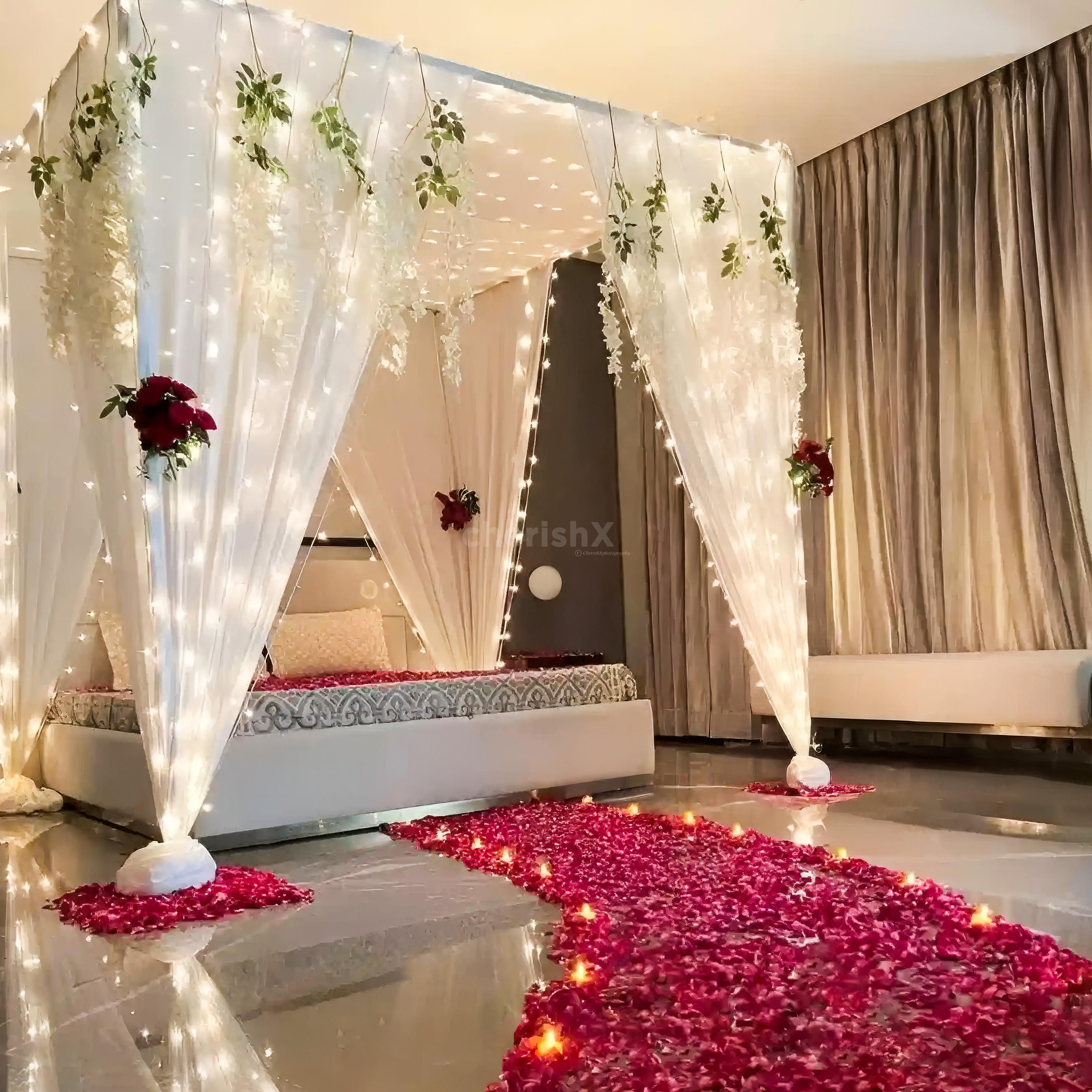 Fresh rose petals welcome the couples into the vibrant ambience filled with love