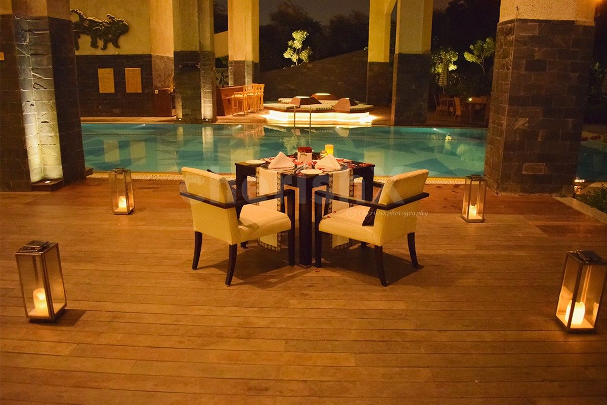 Poolside Candlelight Dinner Setup at Taj Vivanta, Dwarka