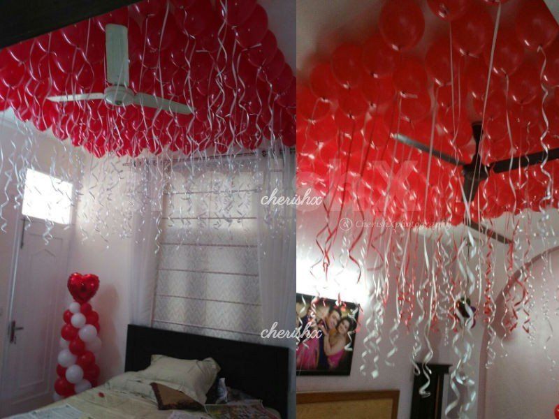 Red Balloons Tower with a Heart Shape Balloon on it