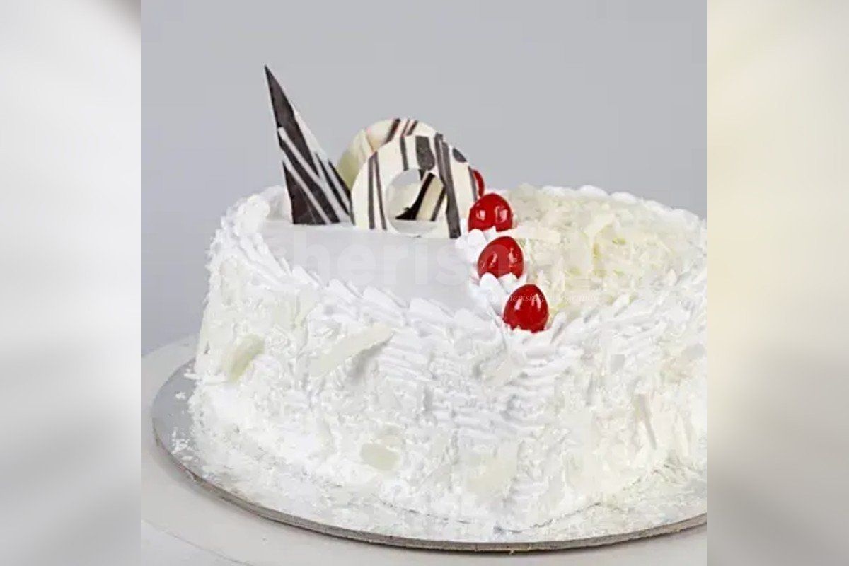 Delicious white forest heart shape cake by cherishx