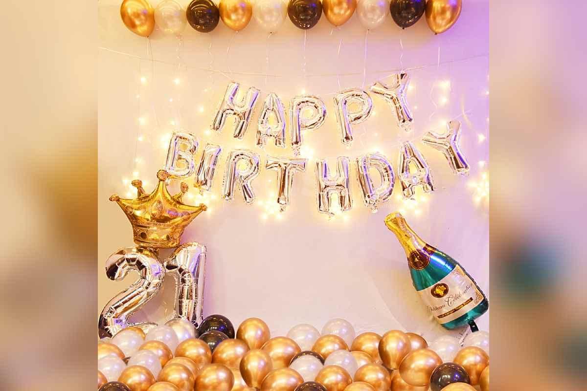 Balloon room decoration for a birthday with a silver theme.