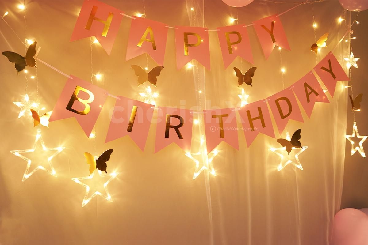 White Net Cloth & Star LED Lights are used in this theme Decoration for Room.