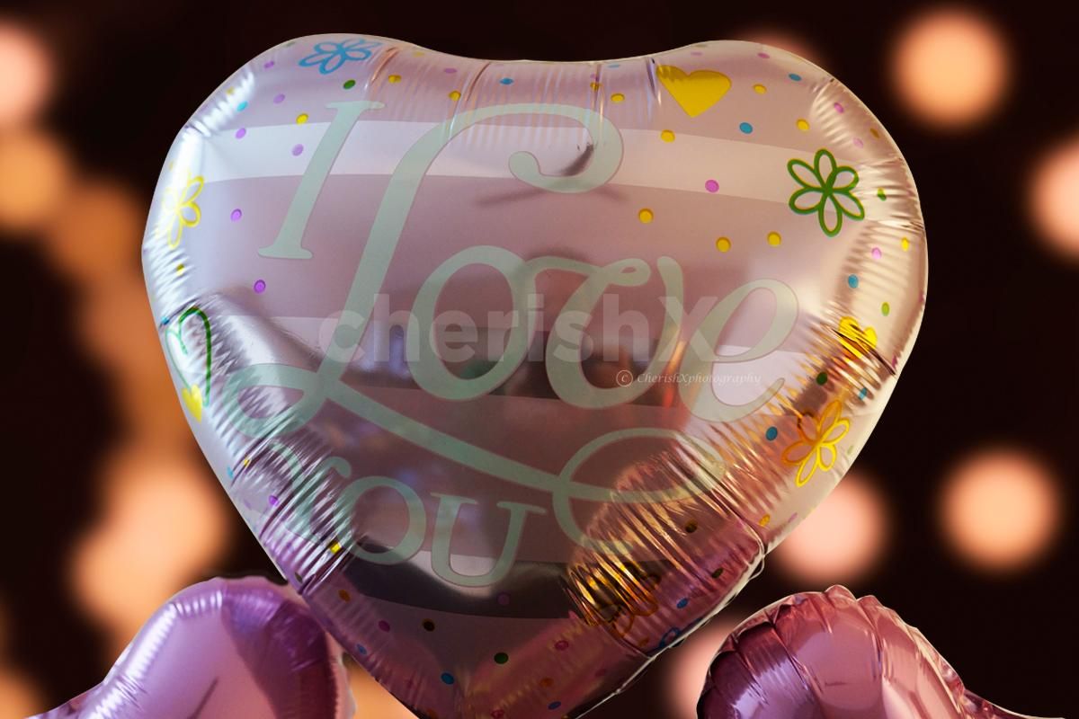 A pink big heart-shaped foil balloon of 'I Love You' to take your love by surprise.