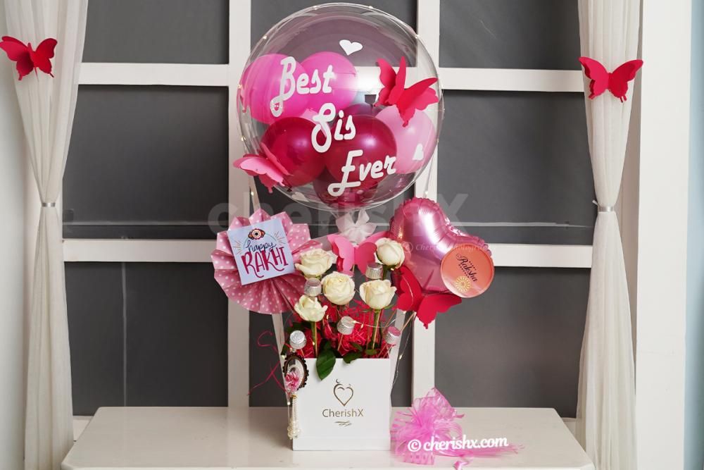 A Breathtaking Pink Rakhi Balloon Bucket for sister by CherishX!