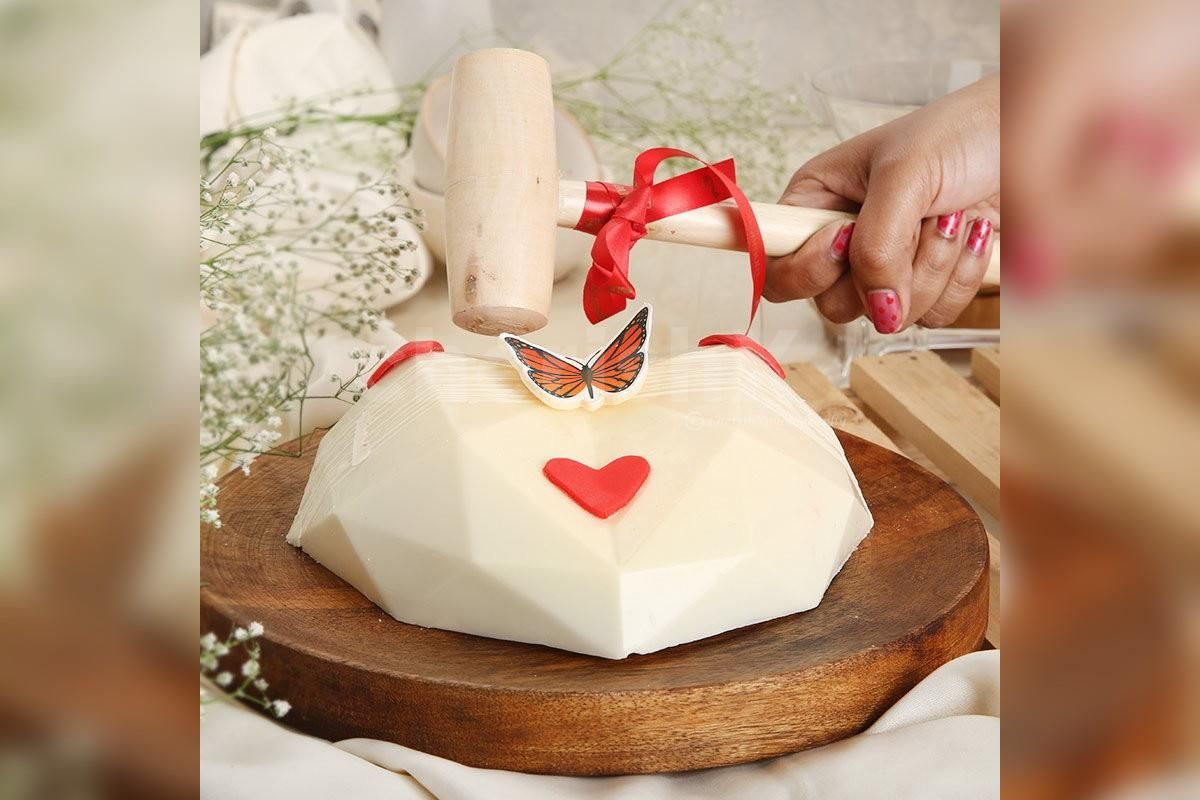 Exciting and fun Pinata red velvet cake by cherishx on your special day