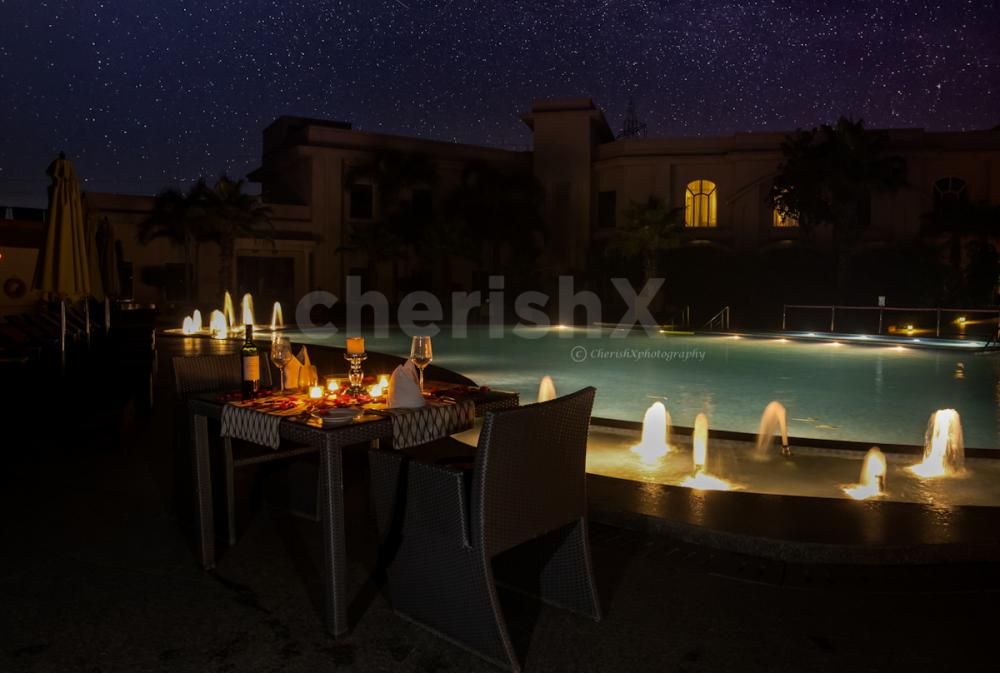 Make yoru partner feel special with CherishX's Poolside Dinner Experience at the Luxurious Umrao in Delhi.