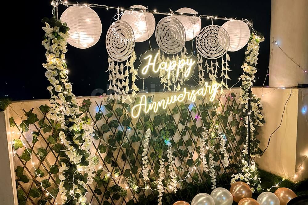 Surprise your husband or wife with CherishX's Premium White Anniversary Decor!