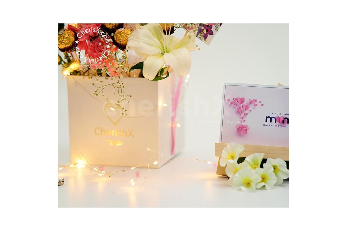 Send love in the most beautiful way to your mom with CherishX's White and Pink Balloon Bucket- A wonderful Mother's Day Gift