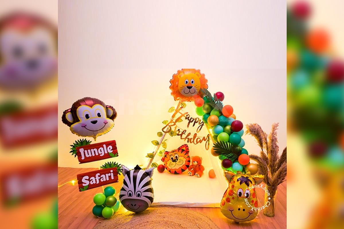 Book a Jungle Theme Decoration for your kid's birthday.