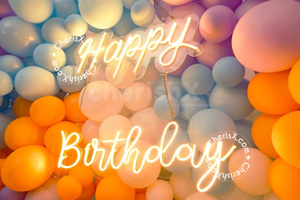 An LED Digit Marquee with pastel balloons and neon signage- imagine the elegance and vibrancy.