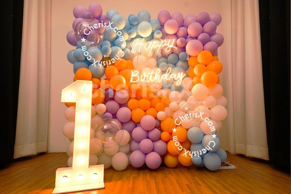 An LED Digit Marquee with pastel balloons and neon signage- imagine the elegance and vibrancy.