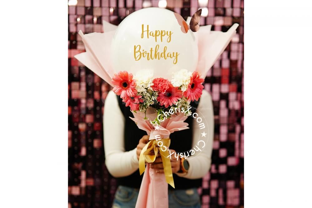 The pink and white flower arrangement is elegant and classy