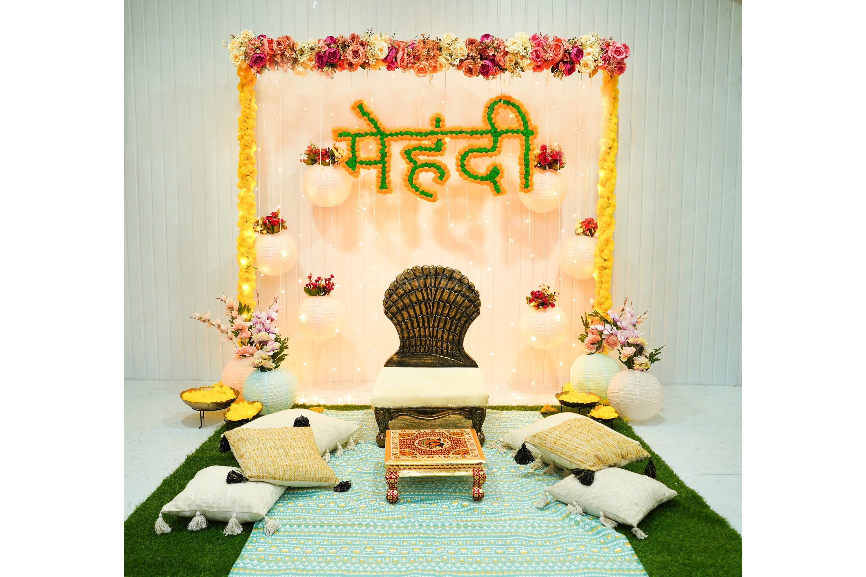 The floral décor mehndi setup is special for its loud but elegant intricacies