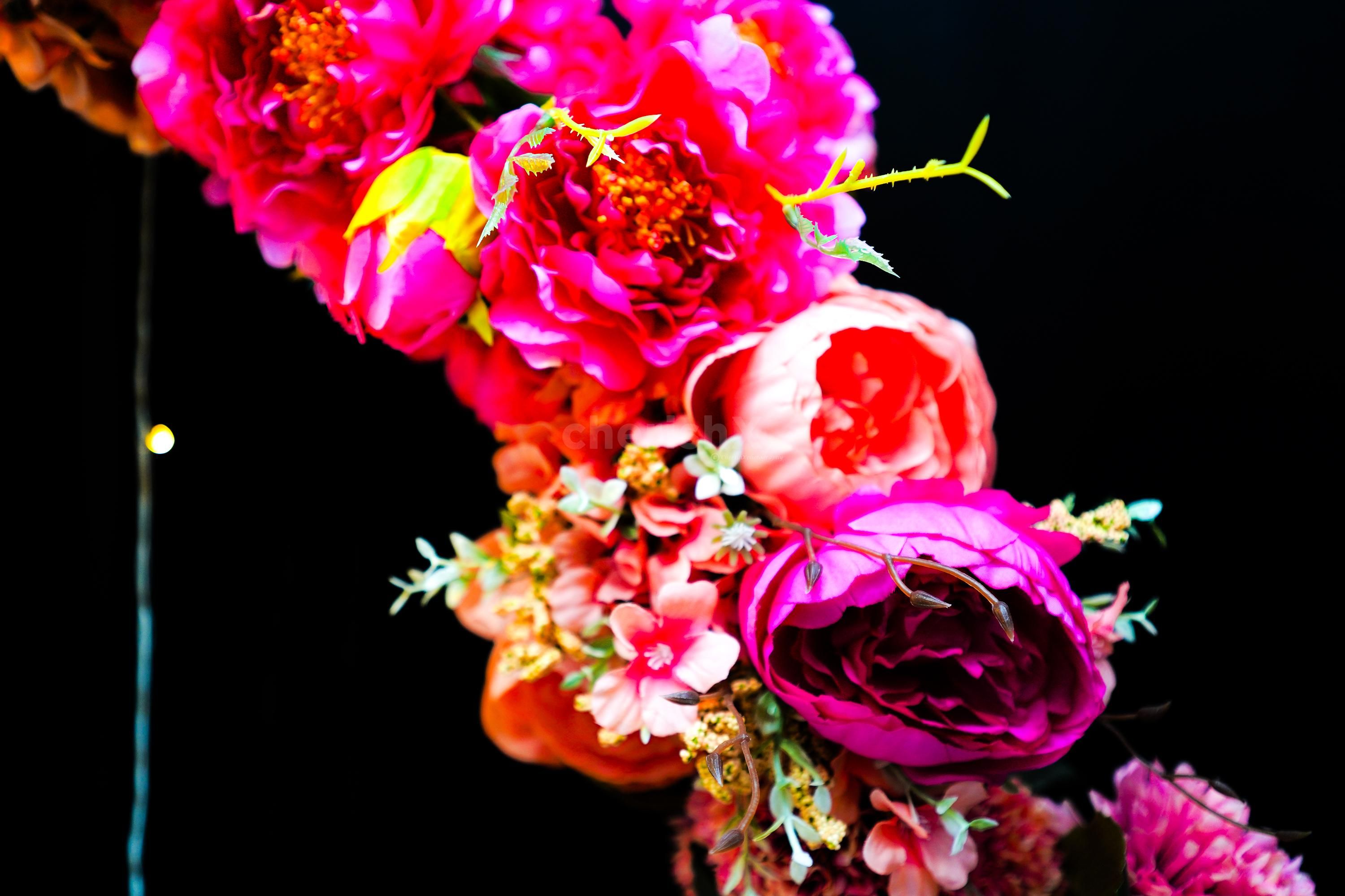 Experience the magic of togetherness like never before with our heartwarming ring floral backdrop.