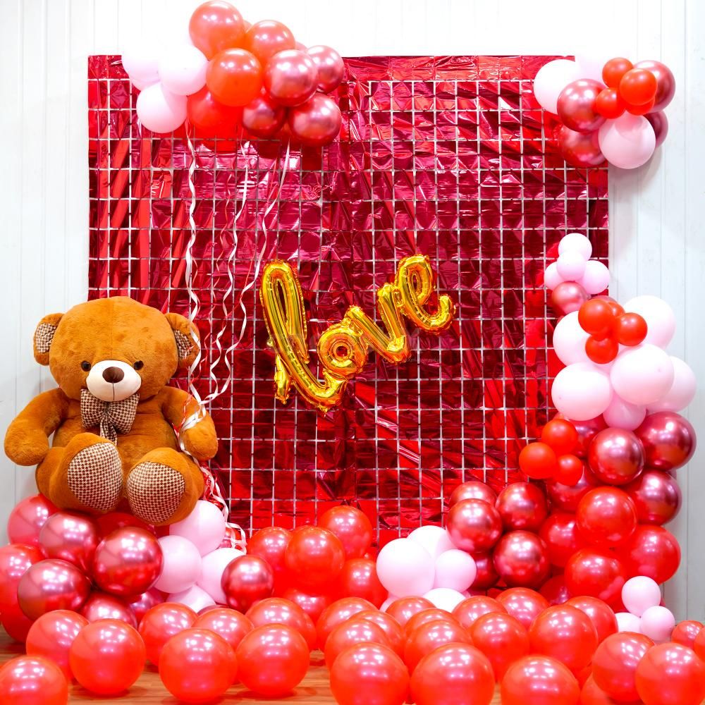 A romantic Valentine's Day setting with pastel pink, pink chrome, and red balloons,