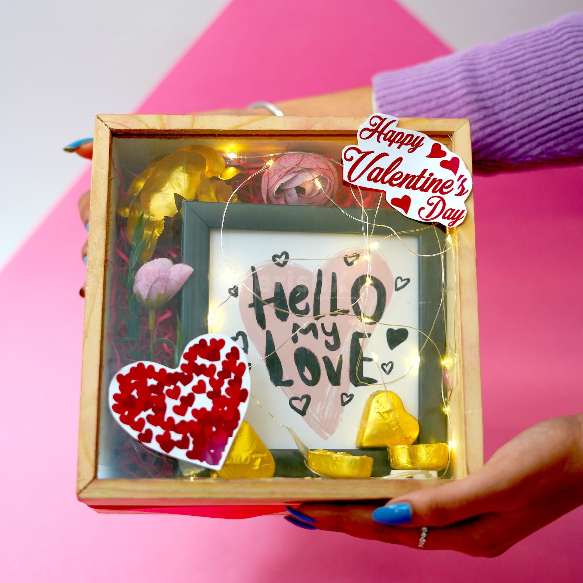 A Valentine's Elegance Rose Hamper, featuring a luxurious MDF box adorned with intricate detailing.