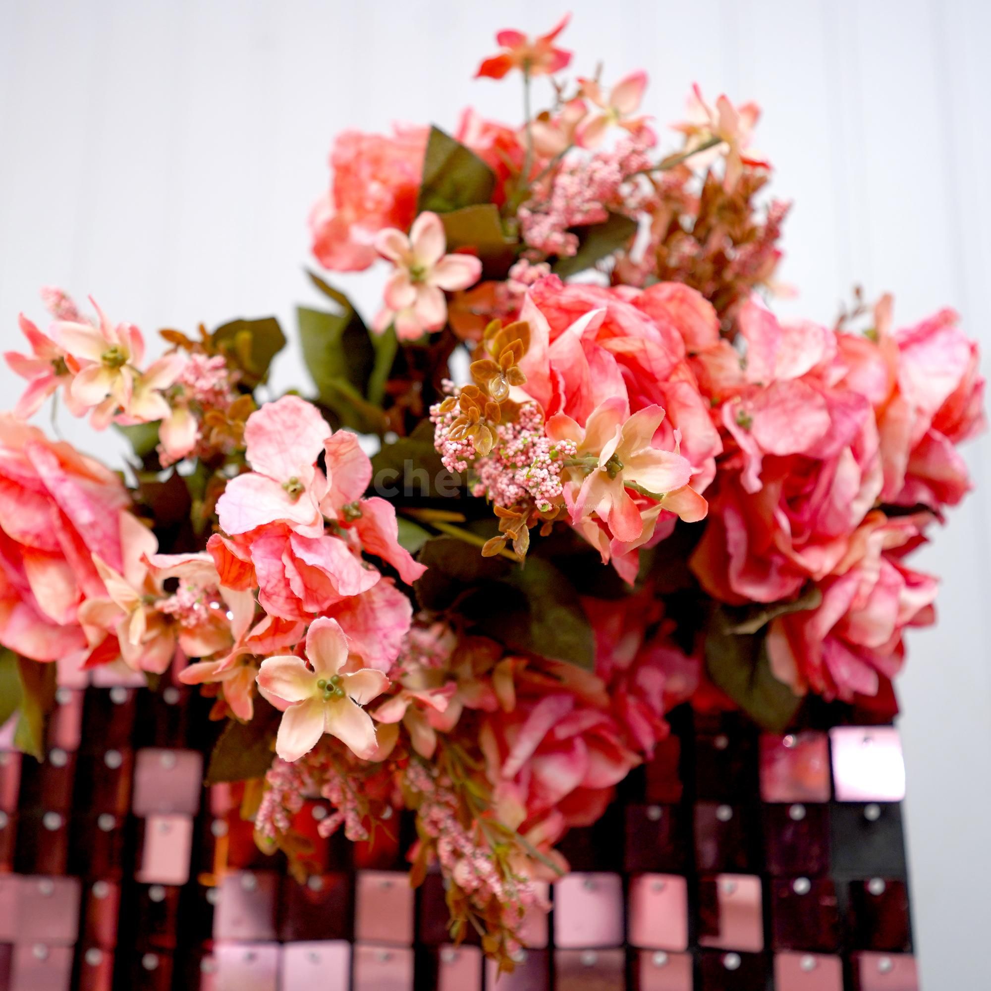 Elevate your birthday bash with our exquisite pastel pink and rose gold sequin backdrop.