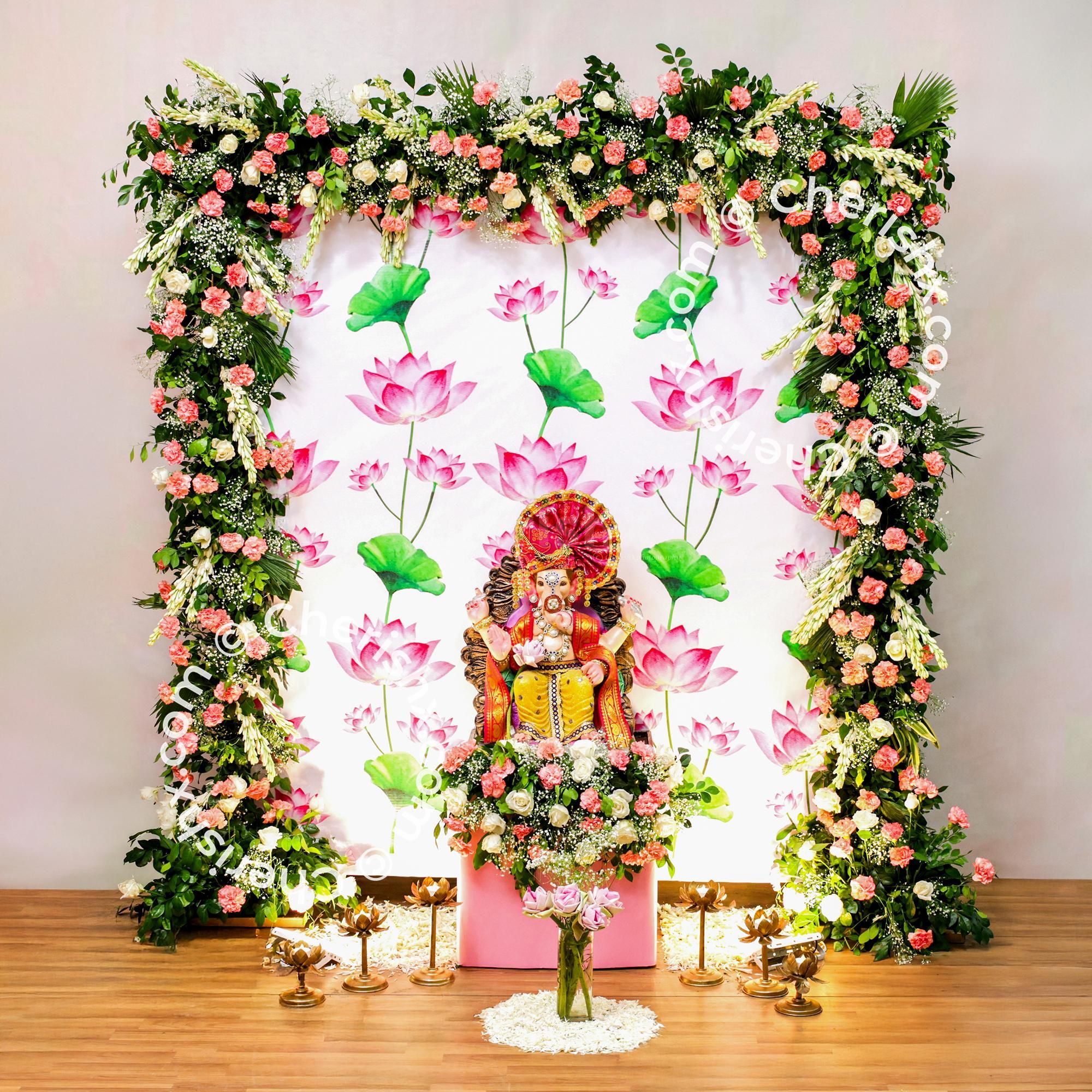 A 6x6ft flex backdrop stand with oversized lotus flowers and lush green leaves