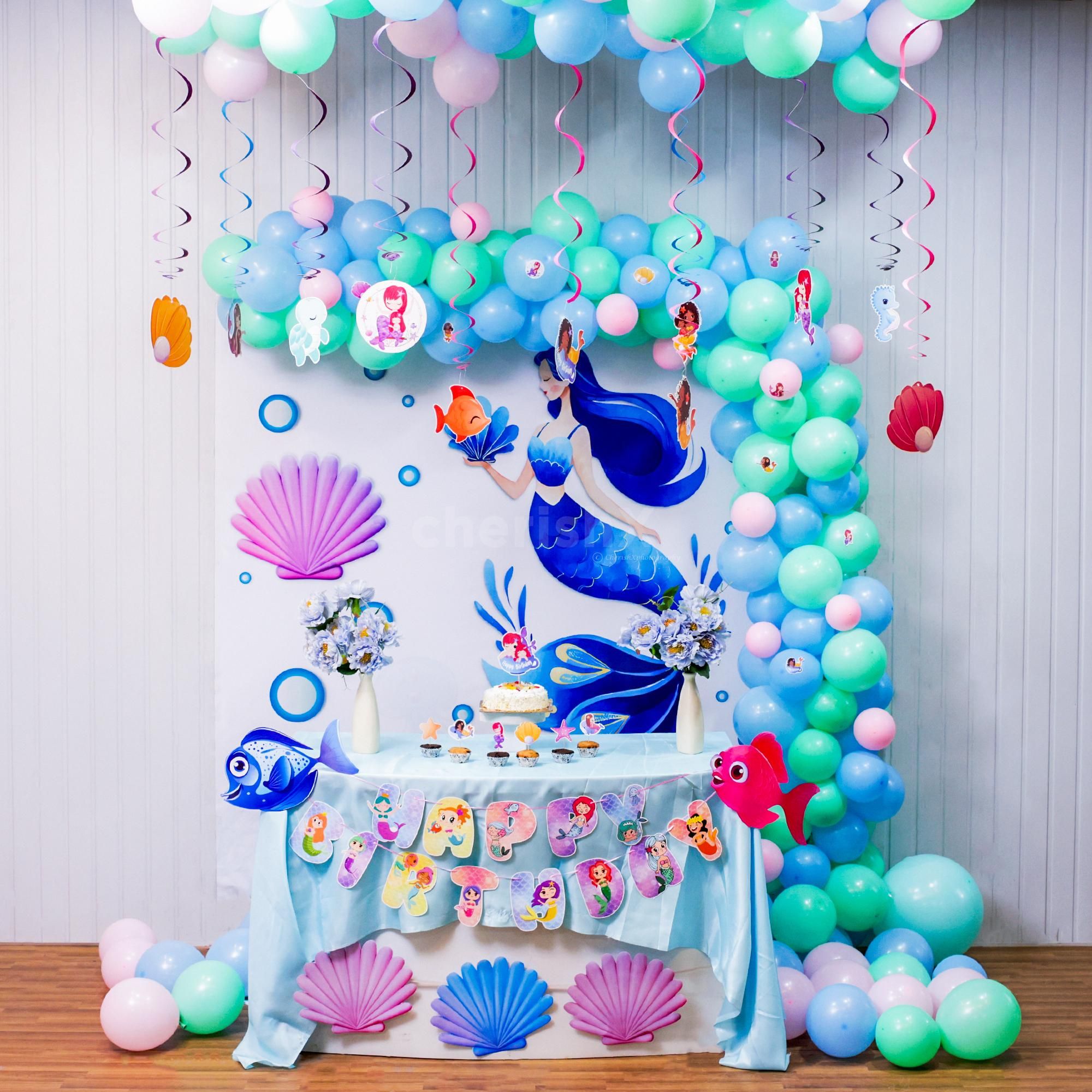 Fish swam in frosting while shells guarded the cupcake stash