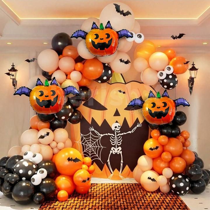 Halloween balloon arch with retro skin and black polka dot balloons is spooky yet stylish