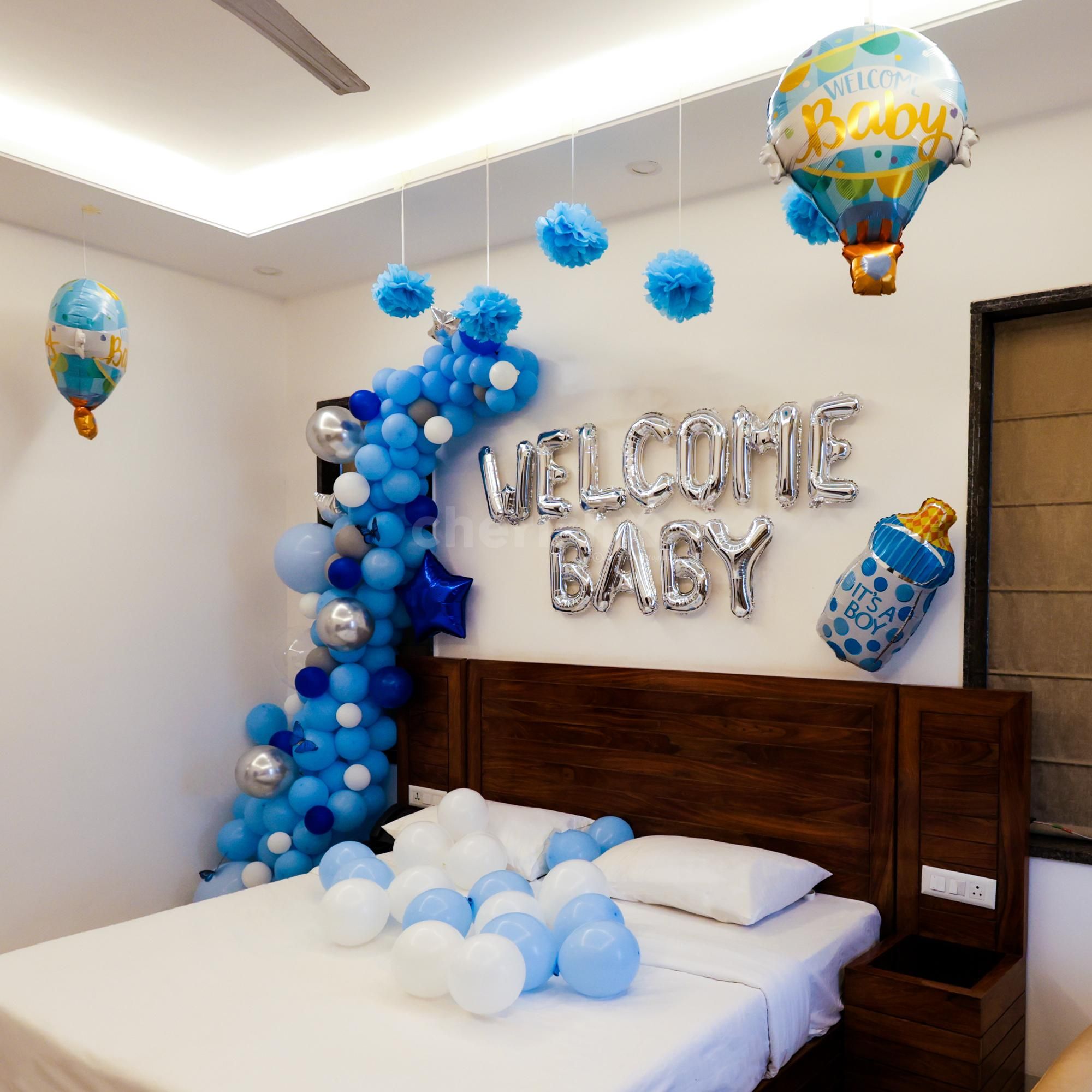 Drifting silver and star balloons give the space a touch of shine.