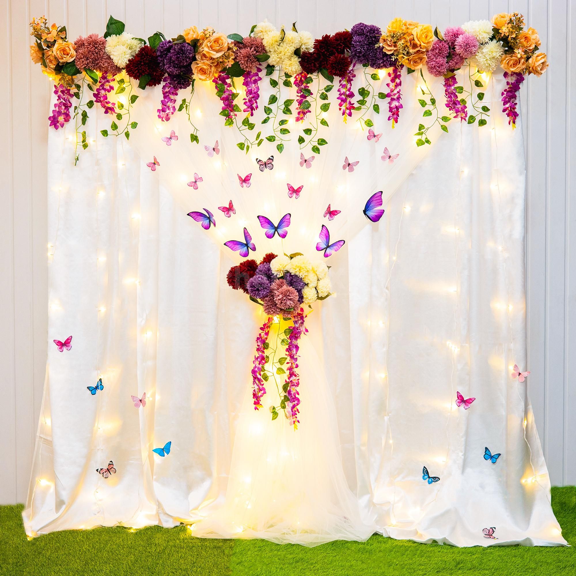 A fantastical white satin backdrop for your roka ceremony