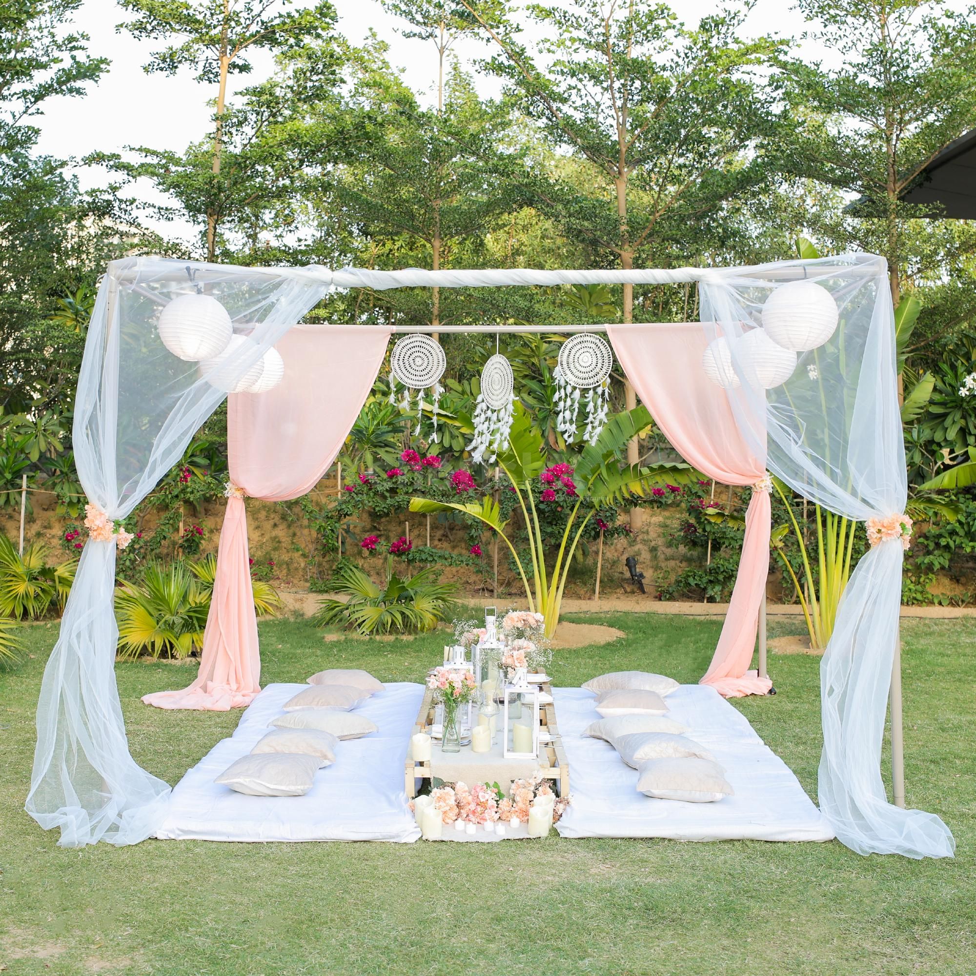 Soft drapes and florals bring a dreamy garden atmosphere to life.