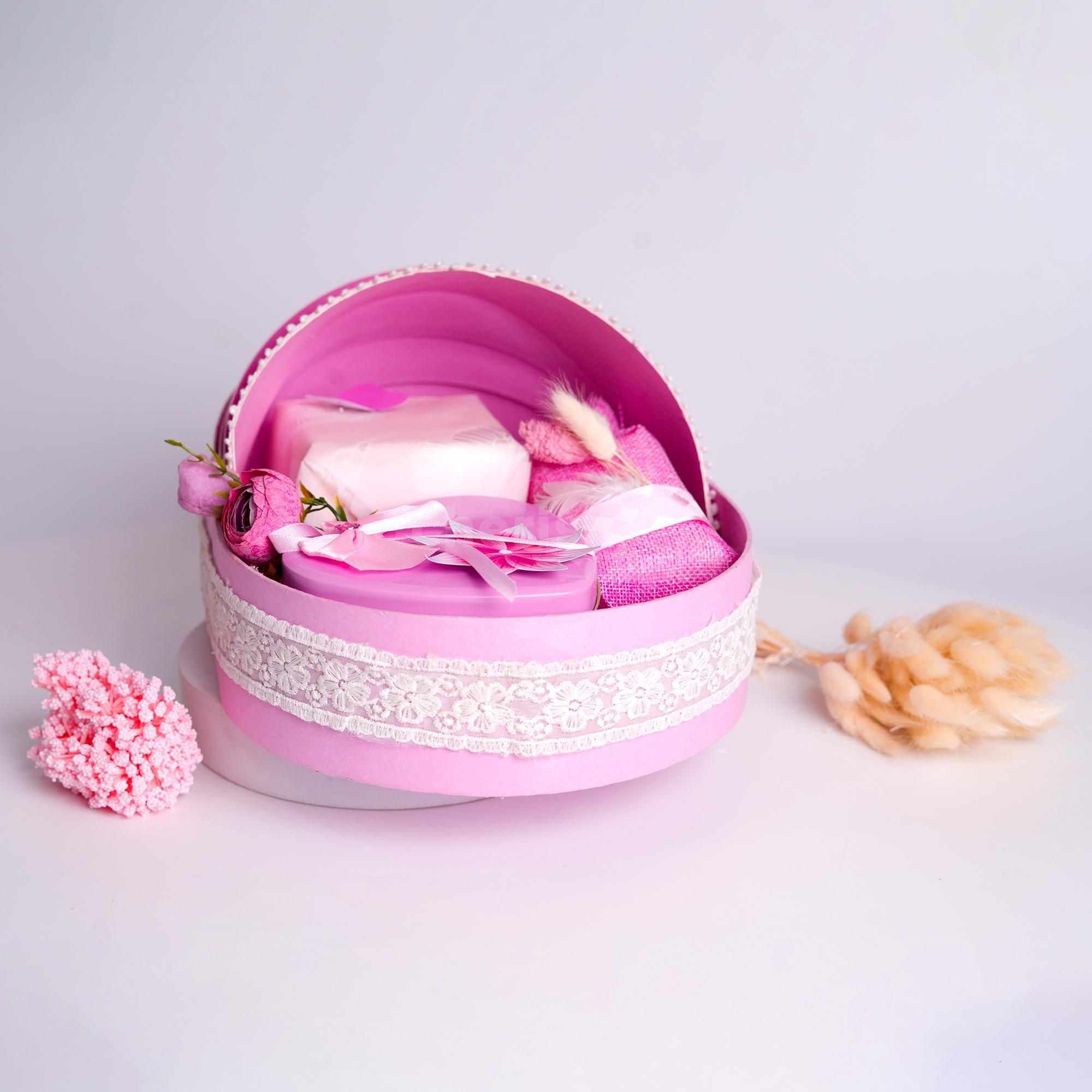 Light pink shades and tiny lace trimming create a period treasure.