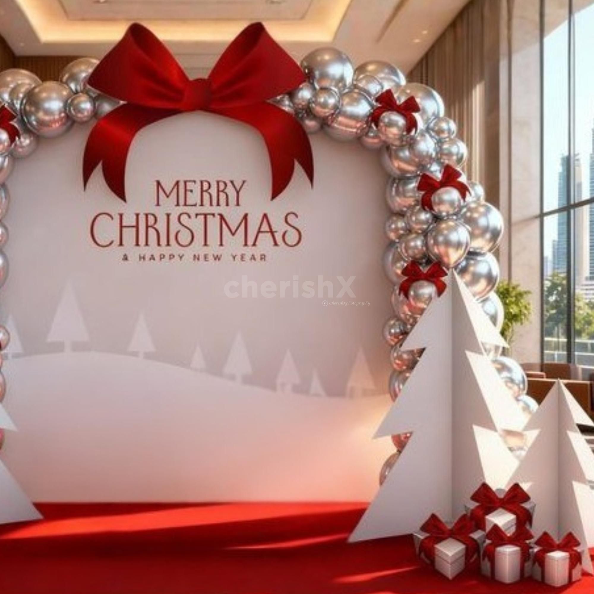 Shiny silver balloons arch reflect twinkling lights, sending shimmery festive vibes