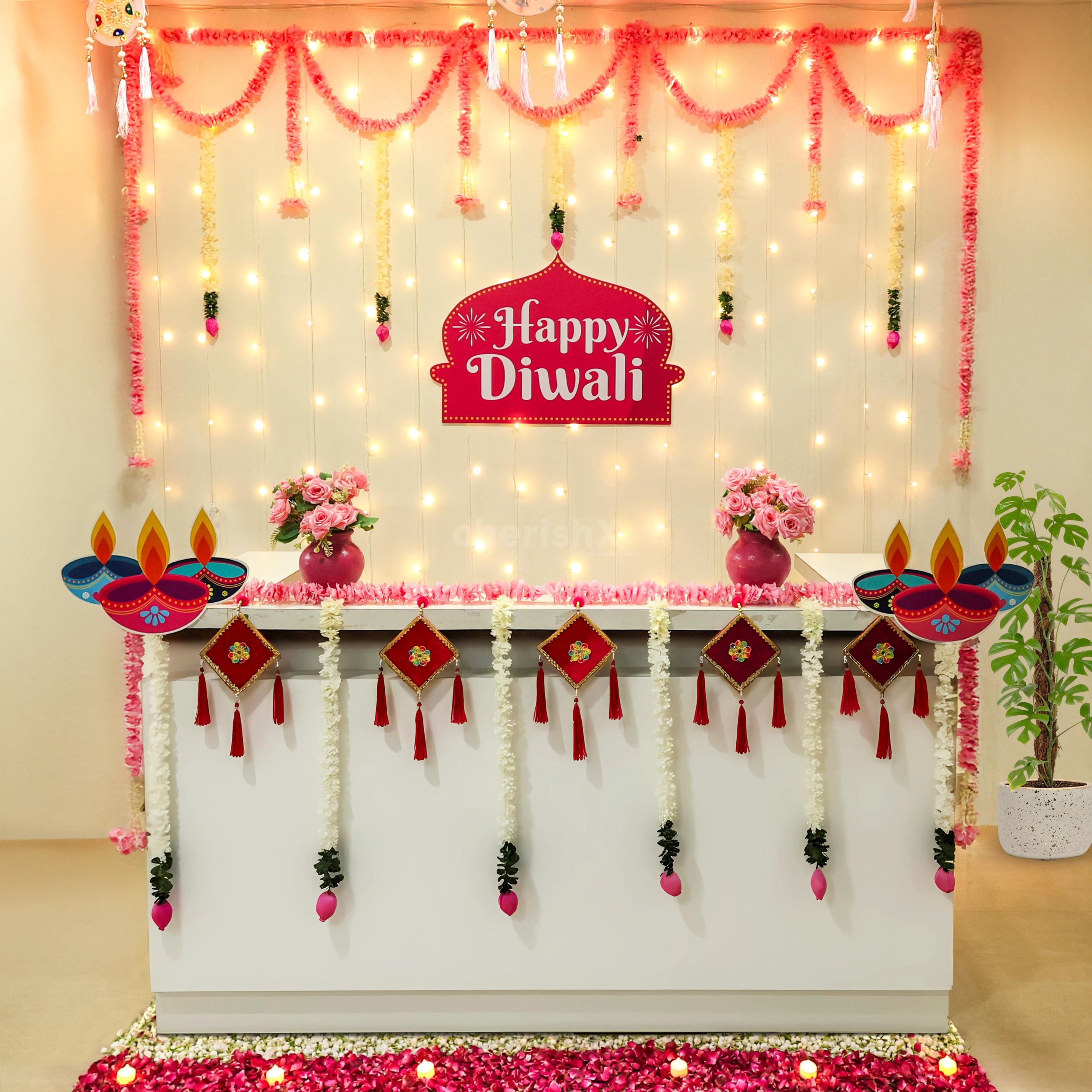 Fairy lights and red velvet tassels add elegant festivity to the office's Diwali spirit.