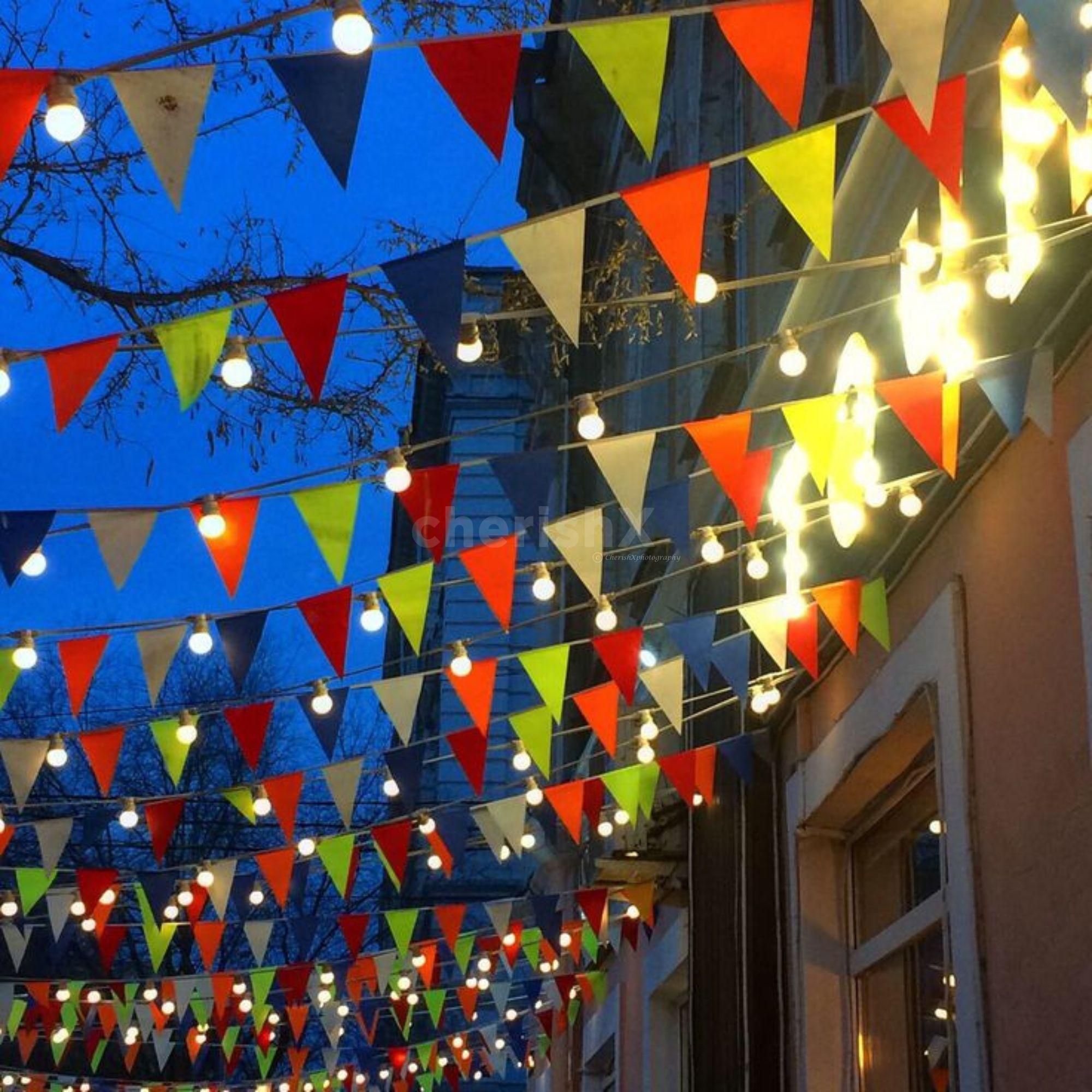 A country Holi party under colorful buntings and fairy lights!