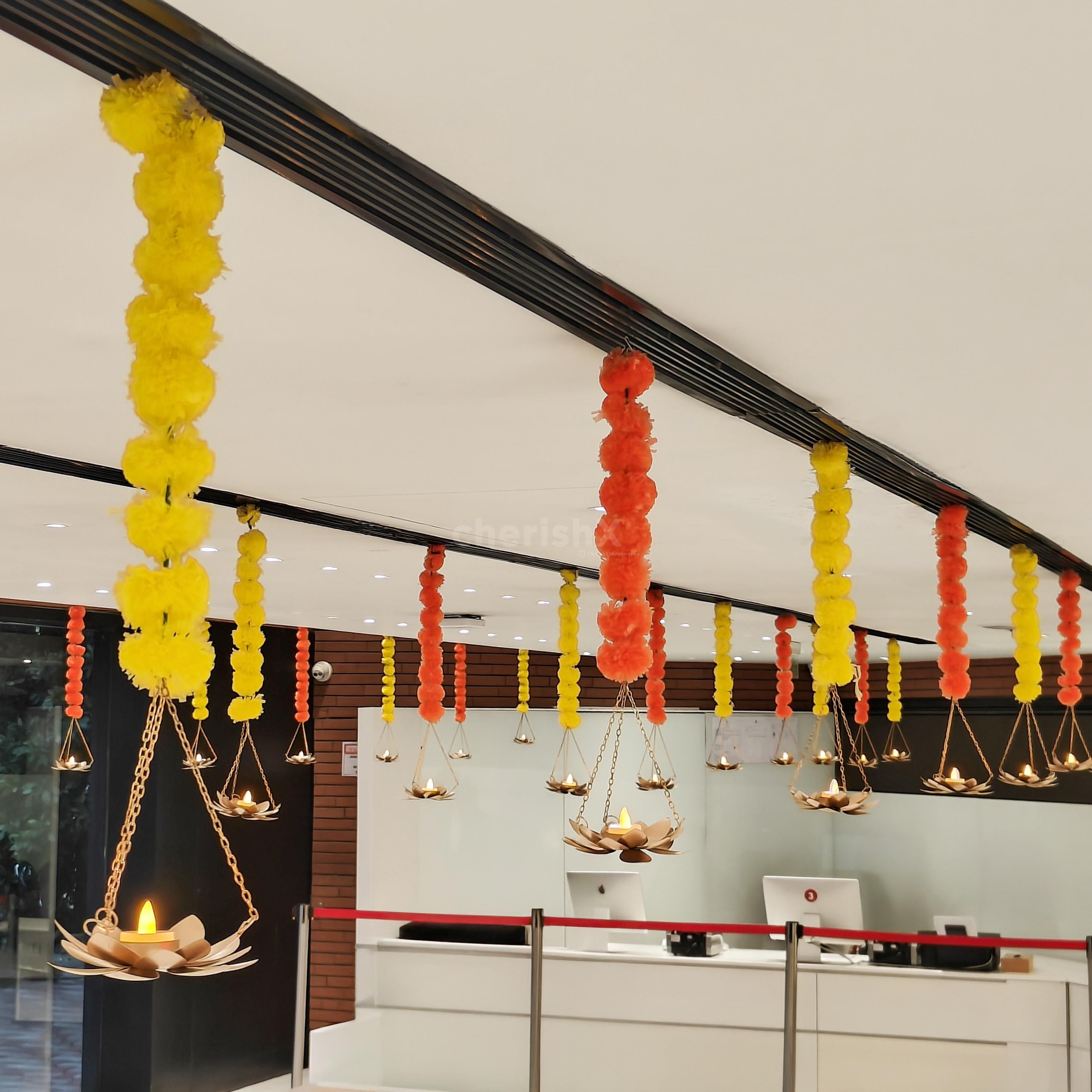 Brass lotus decor elements add glow with warm, festive lighting.