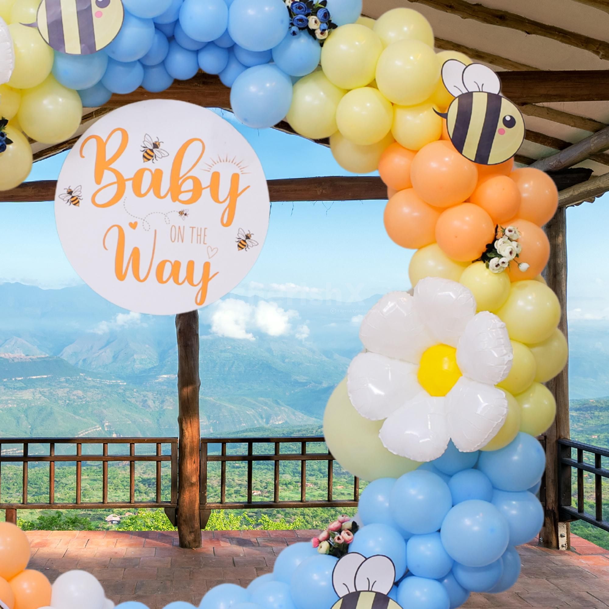 Winnie the Pooh standee adorned with floral highlights.