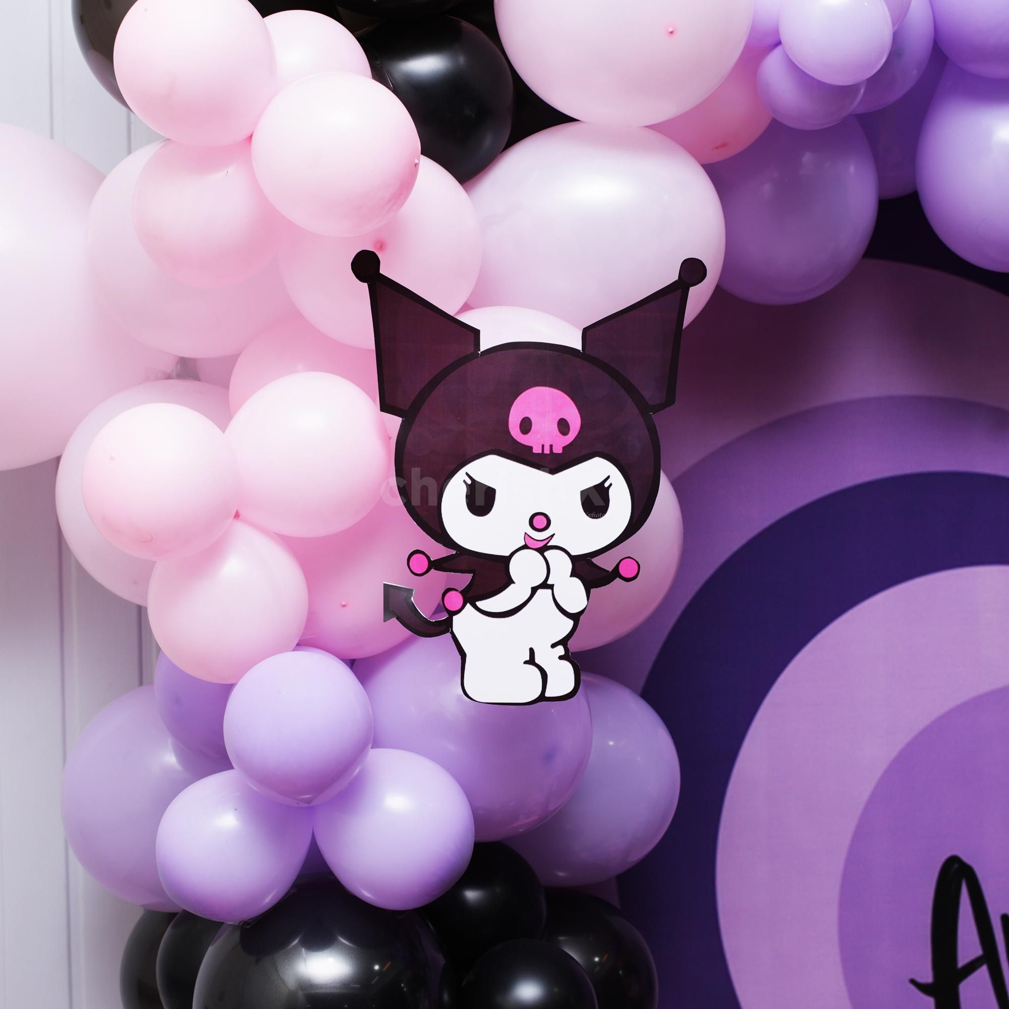 Drifting theme balloons add a celebratory ambiance.