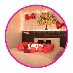 Romantic cine and dine setup with projector and candle light dinner